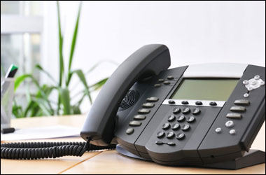 Surge protection for telephone devices